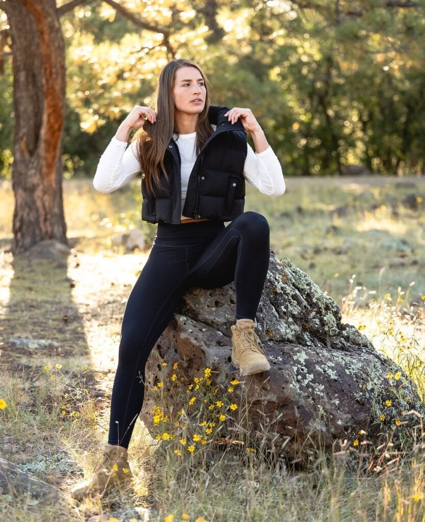 Cropped Puffer Vest Over White Top And Black Leggings — Cute Hiking Outfit Inspo