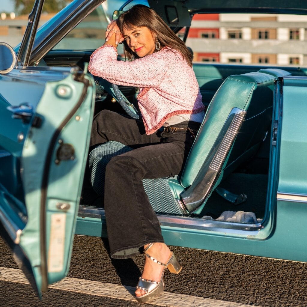 Black Flared Jeans with a Pink Sequined Jacket — Cute Jeans Outfit Inspo