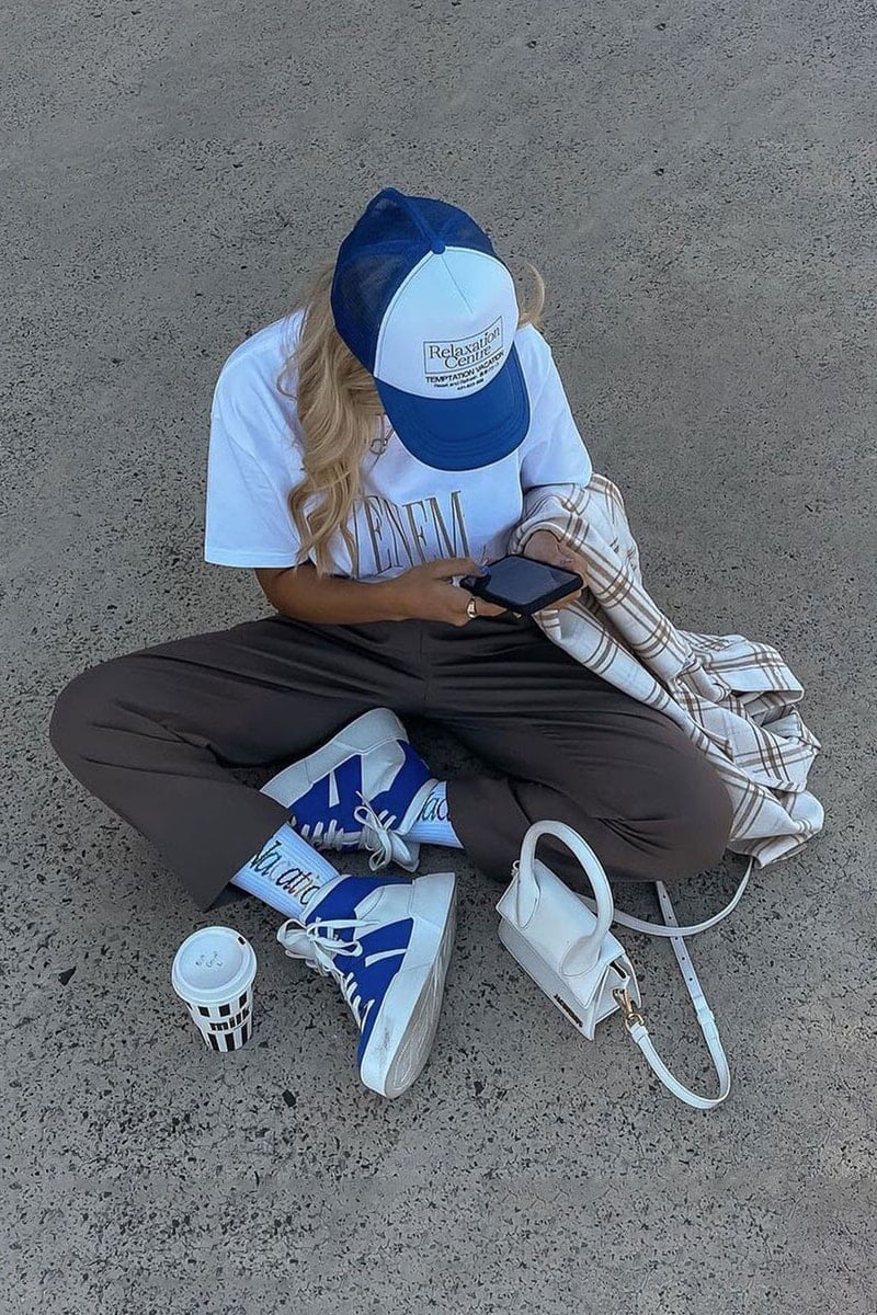 Graphic T-shirt and Brown Trousers with Sneakers, Close-Up Take Graphic T-shirt and Brown Trousers with Sneakers, Close-Up Take — Cute Outfit Inspo for School