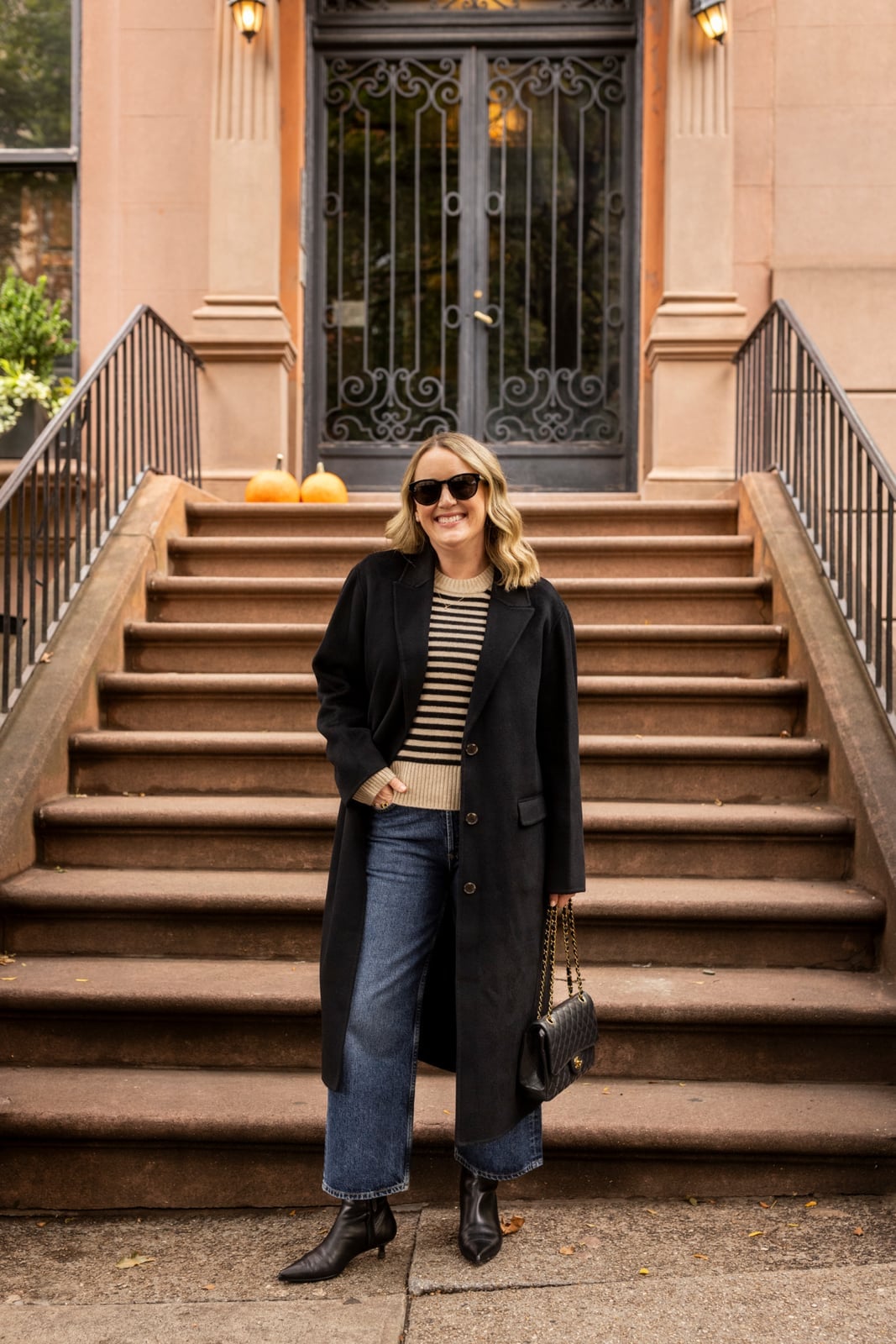 Long Black Coat with Striped Sweater and Wide-Leg Jeans Long Black Coat with Striped Sweater and Wide-Leg Jeans — Cute Outfit Inspo for School