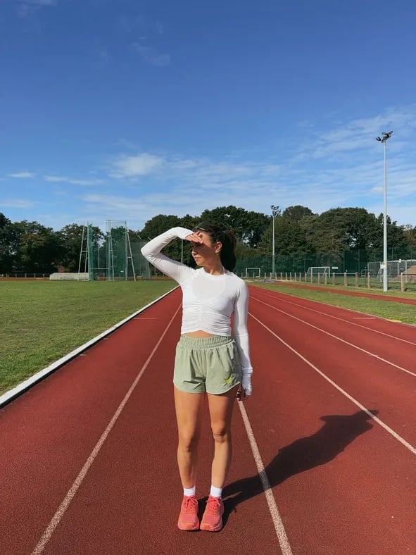 White Long-Sleeve Top and Sage Green Shorts — Cute Running Outfits
