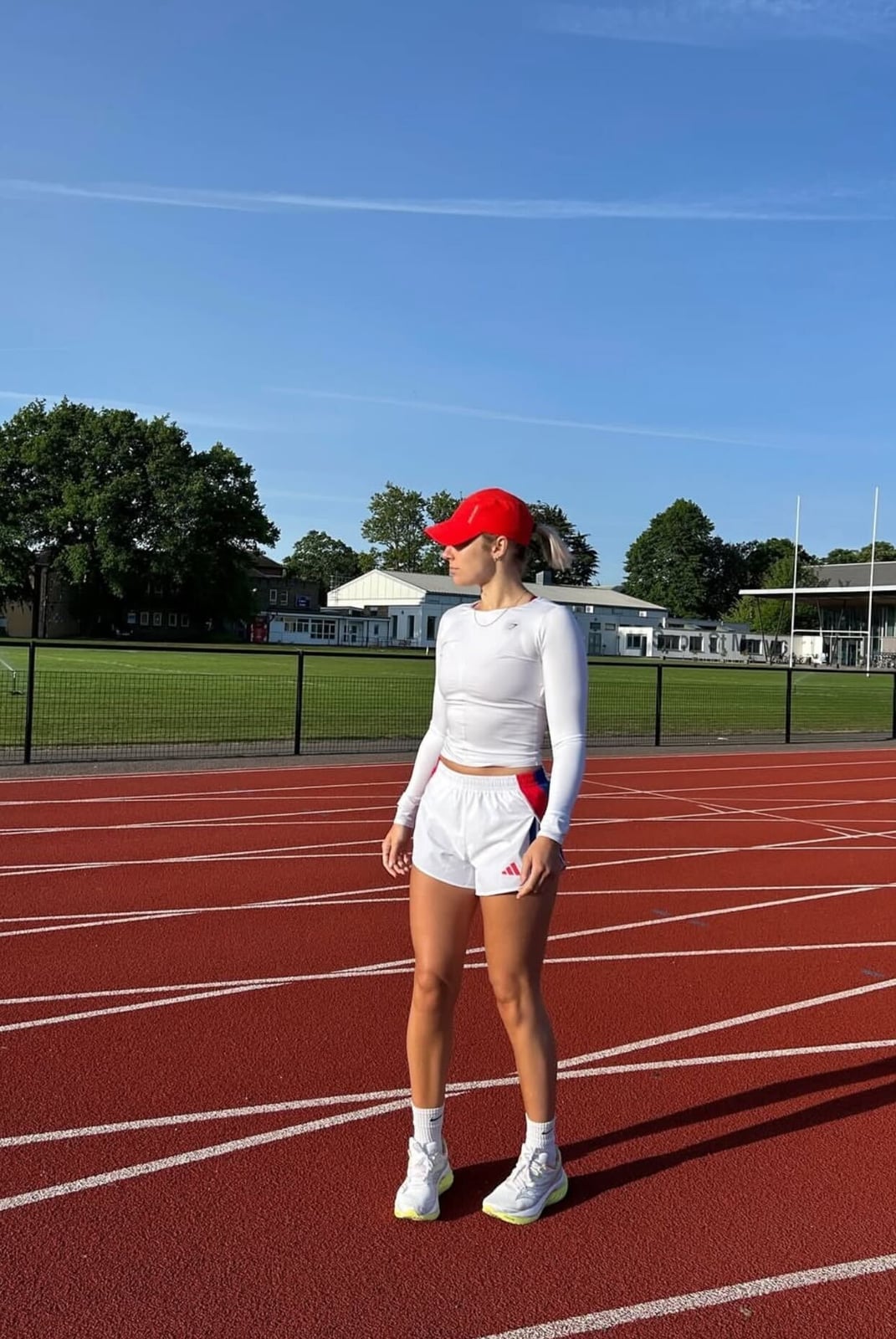 White Athletic Top and Shorts with Red Accents — Cute Running Outfits