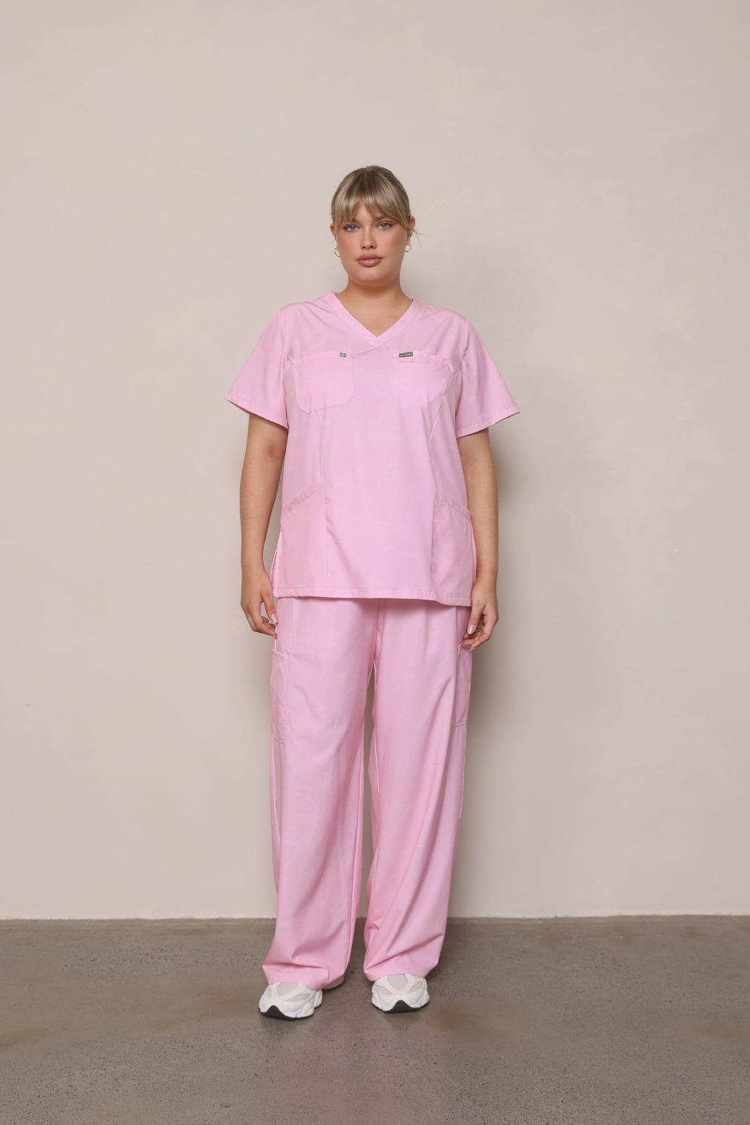 Soft Pink V-neck Scrub Top with Wide-Leg Pants — Cute Scrubs Outfits