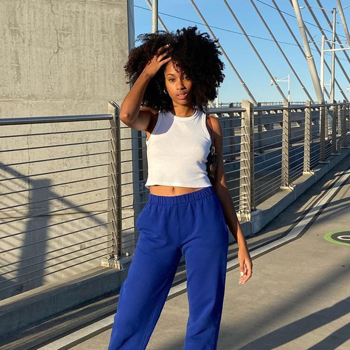 Royal Blue Wide-Leg Sweatpants With White Crop Top — Cute Sweatpants Outfit Inspo