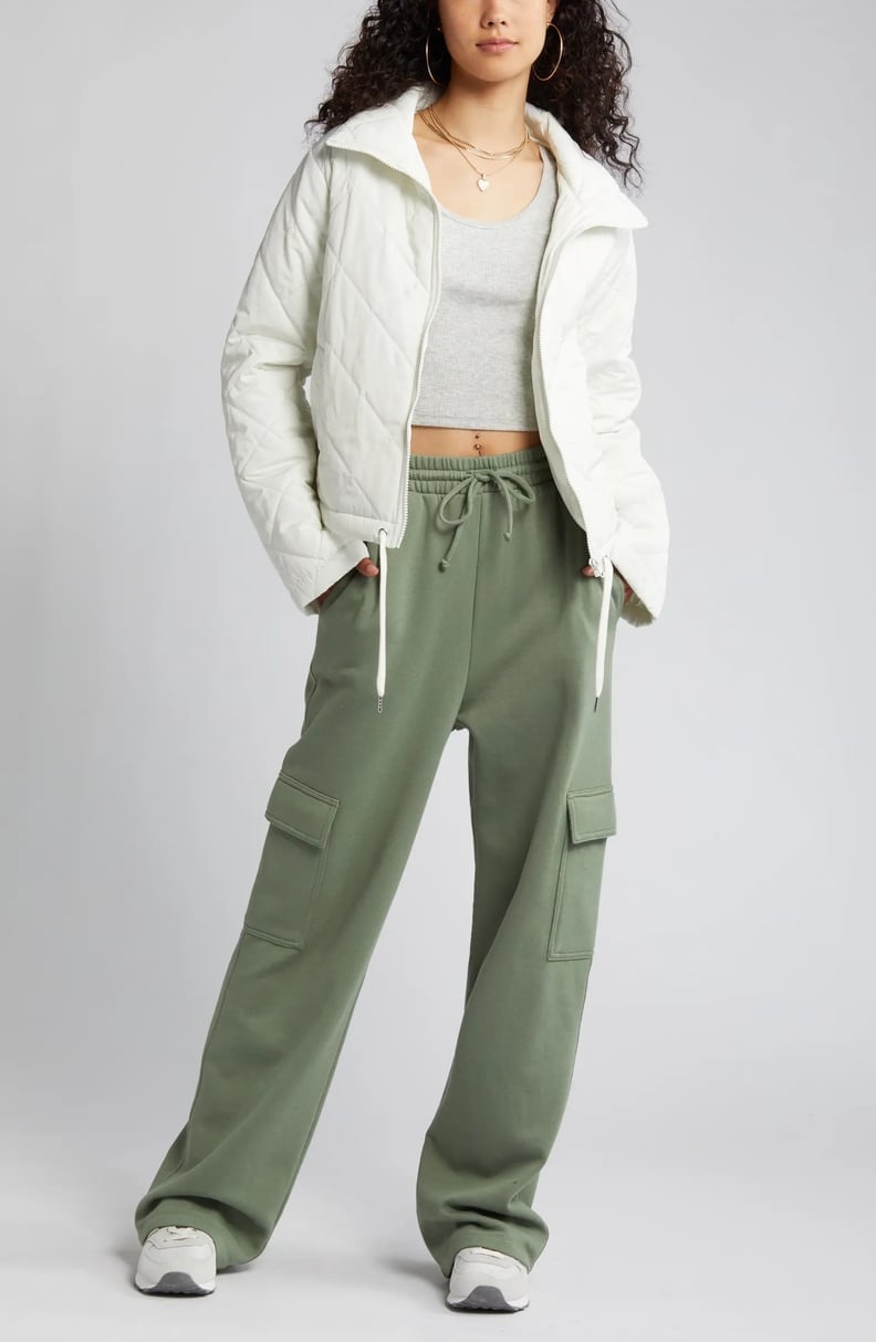 Olive Green Cargo Sweatpants With White Jacket, Close-Up Take — Cute Sweatpants Outfit Inspo