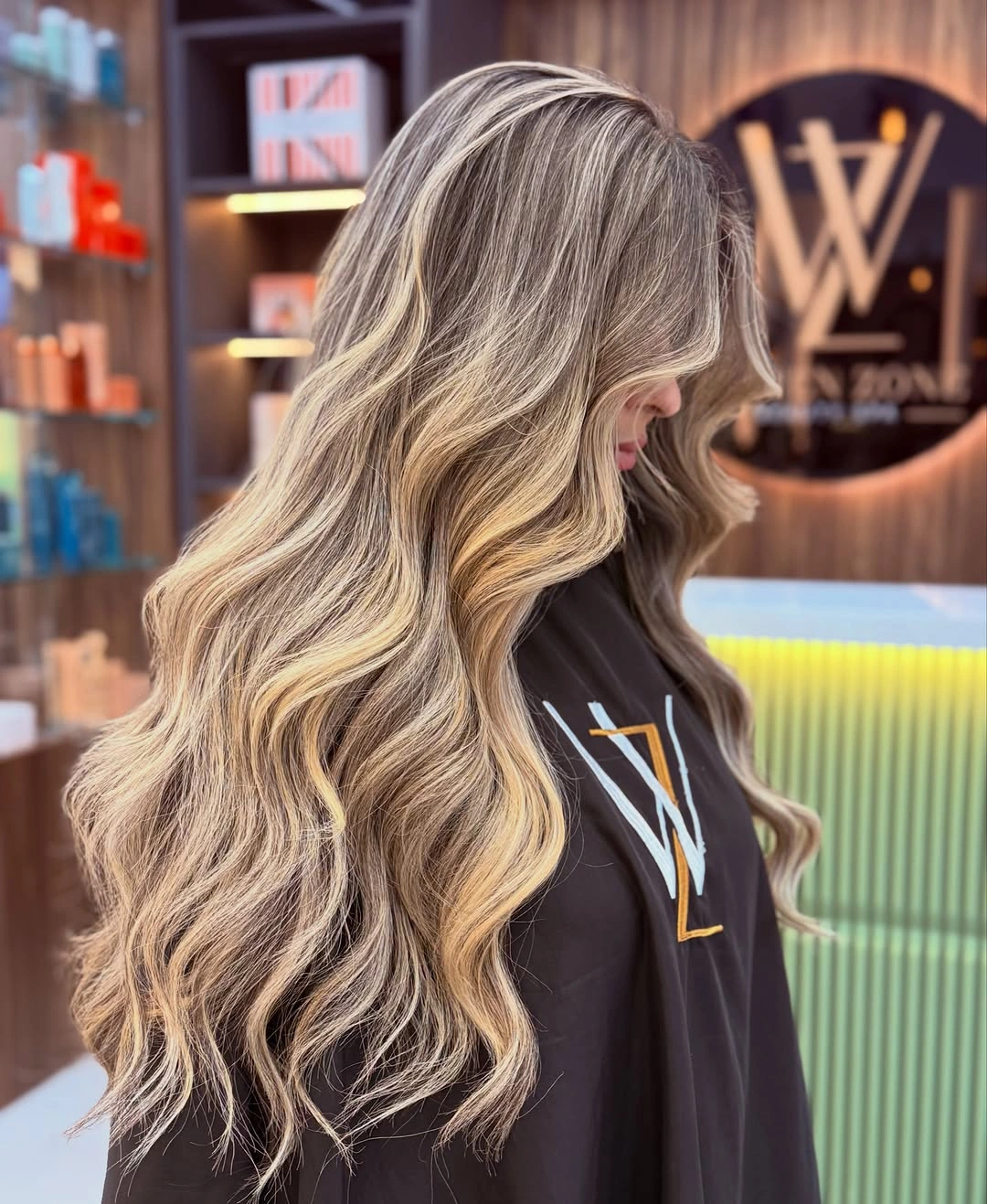 Very long wavy blonde hair with pale and sandy beige ribbons