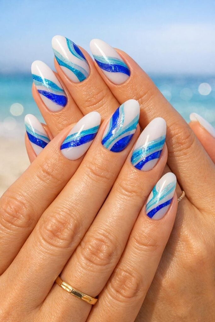 Medium Almond Blue Glitter Wave Stripes Medium Almond Blue Glitter Wave Stripes — Easy Wave Nails
