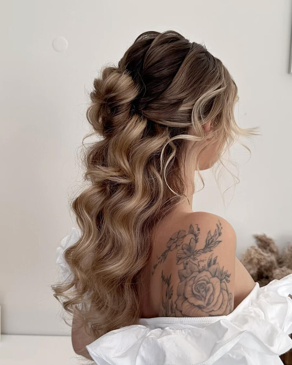 Textured Loose Bun With Wispy Bangs — Easy Wedding Hairstyles for Long Hair
