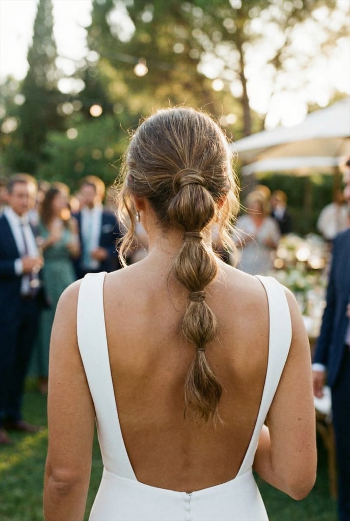 Bubble Ponytail With Face-Framing Strands — Easy Wedding Hairstyles for Long Hair