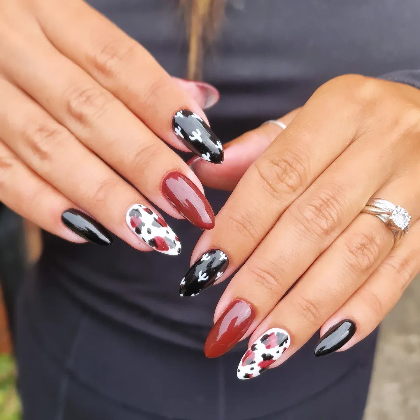 Medium Almond Nails With Black White And Red Accents — Easy Western Nails