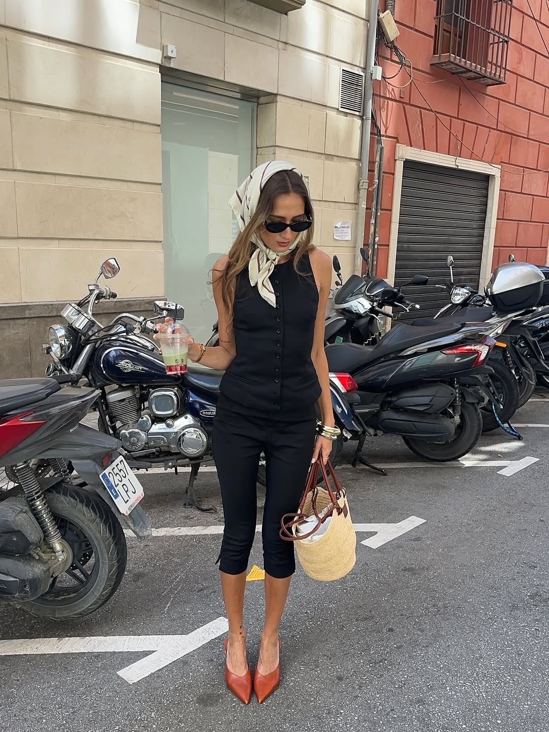 Black Capri Pants In A Sleeveless Jumpsuit — Elegant Black Capri Pants Outfit