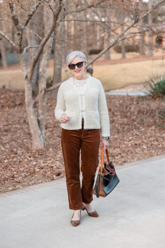 Brown Corduroy Trousers with Cream Pearl Button, Close-Up Take Brown Corduroy Trousers with Cream Pearl Button, Close-Up Take — Elegant Brown Jeans Outfits