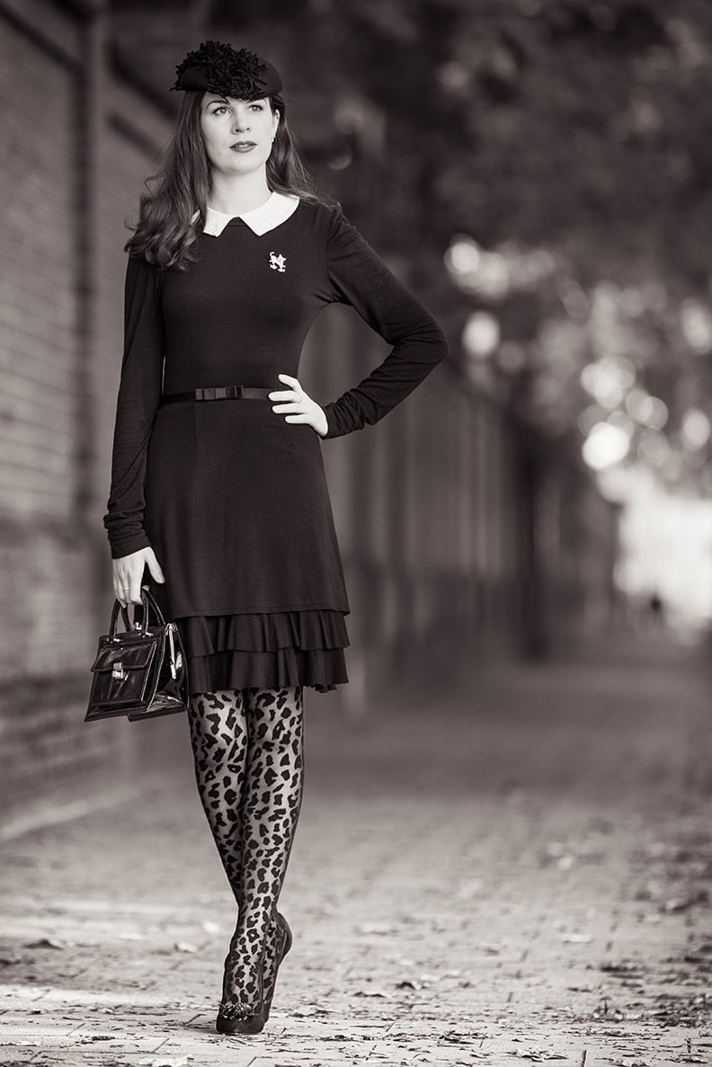 Black Dress with Ruffled Hem and Leopard Tights — Elegant Dark Outfits