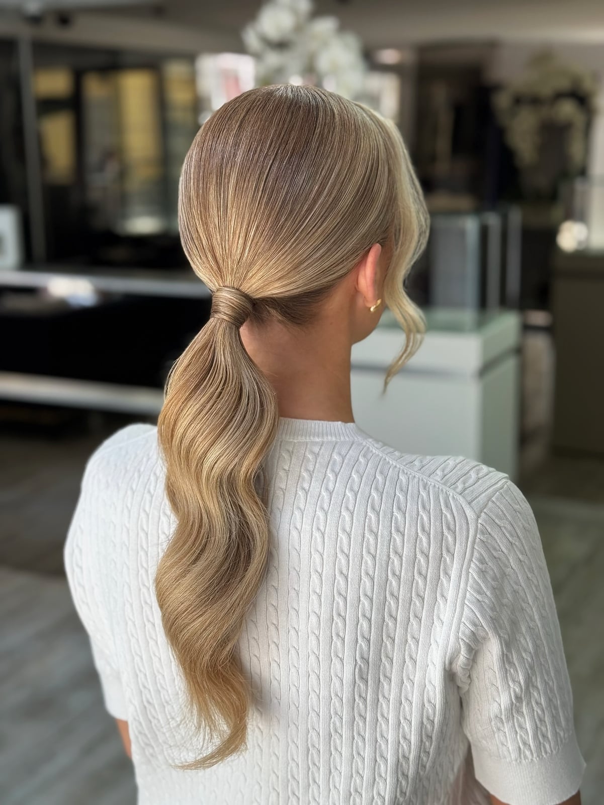 Sleek Mid-Back Ash Blonde Ponytail With Wrapped Base Sleek Mid-Back Ash Blonde Ponytail With Wrapped Base — Elegant Low Ponytail Hairstyles