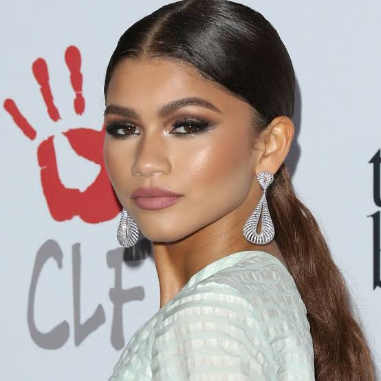 Sleek Mid-Back Dark Brown Ponytail Sleek Mid-Back Dark Brown Ponytail — Elegant Low Ponytail Hairstyles