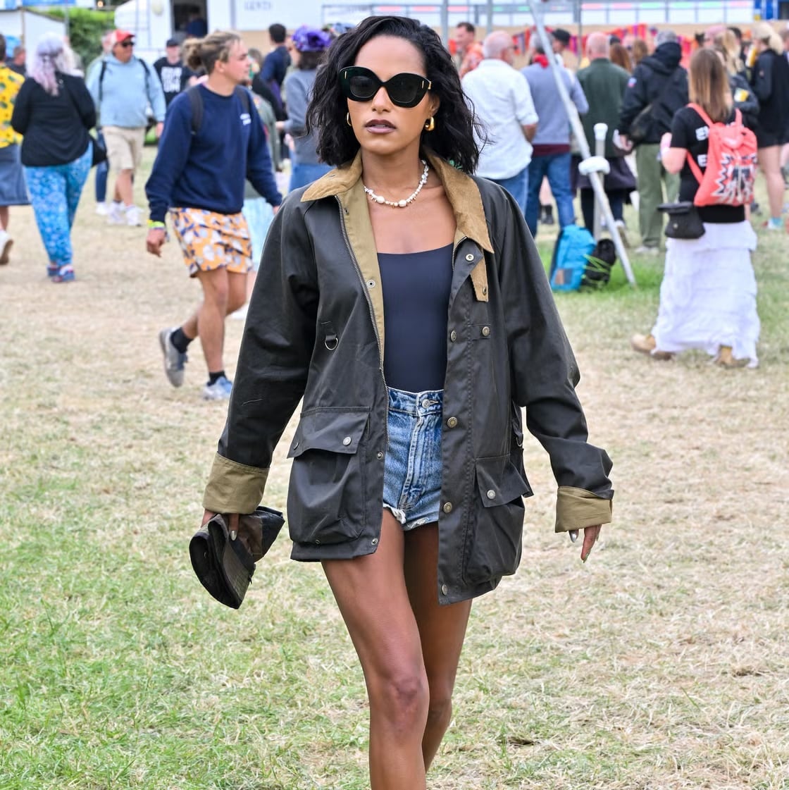 Dark Green Utility Jacket Over Navy Bodysuit and Denim Shorts Dark Green Utility Jacket Over Navy Bodysuit and Denim Shorts — Elegant Rock Outfits