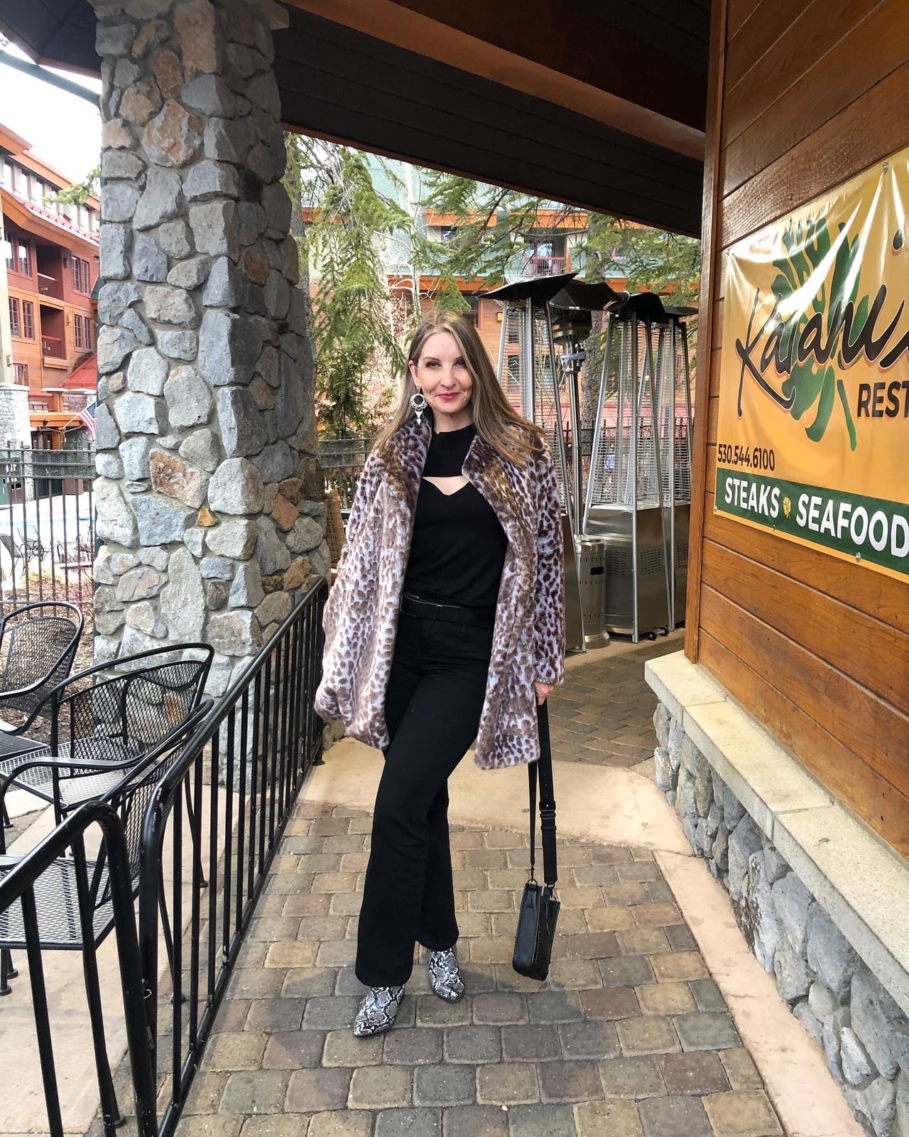 Faux Fur Leopard Print Coat Over Jeans and Black Top Faux Fur Leopard Print Coat Over Jeans and Black Top — Elegant Rock Outfits