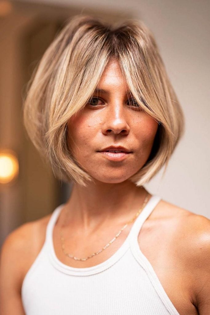 Ash Blonde Layered Bob With Curtain Bangs Ash Blonde Layered Bob With Curtain Bangs — Elegant Short Hair Hairstyles