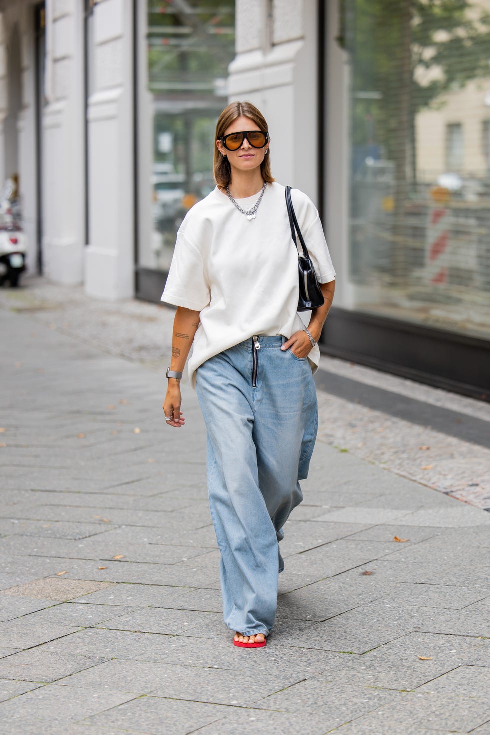 Oversized White Tee with Wide-Leg Denim and Red Slide Sandals Oversized White Tee with Wide-Leg Denim and Red Slide Sandals — Elegant Tshirt Outfit