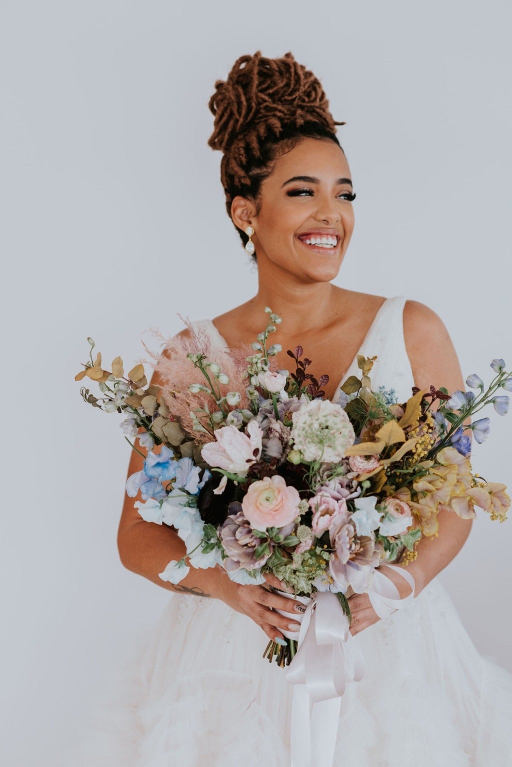 High Textured Updo For Coily Hair — Elegant Updo Inspo