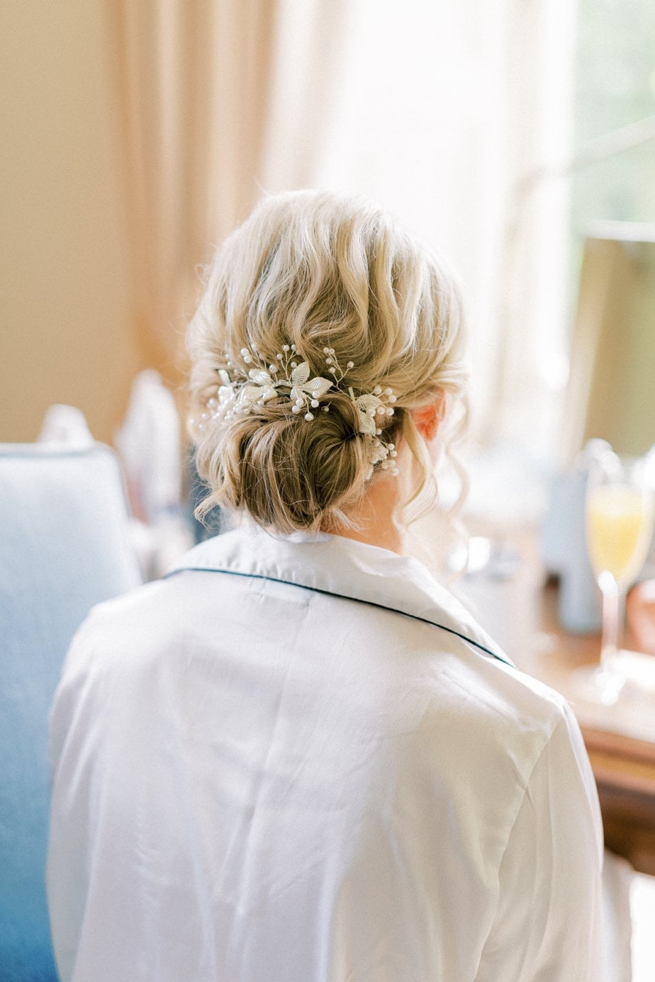 Classic Blonde Bun With Pearl Hairpins — Elegant Updo Inspo