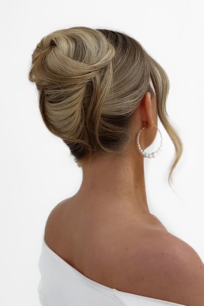 Smooth High Bun With Wispy Bangs — Elegant Updo Inspo