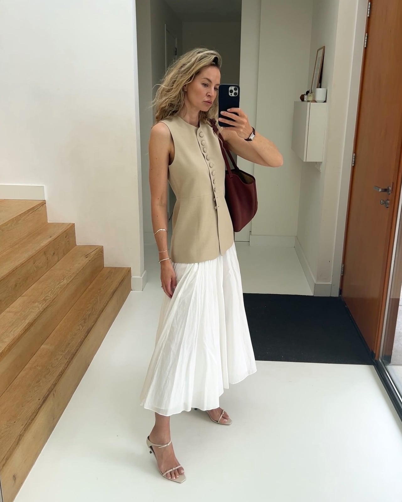 Beige Button-Up Vest Over White Pleated Midi Skirt — Elegant Vest Outfits