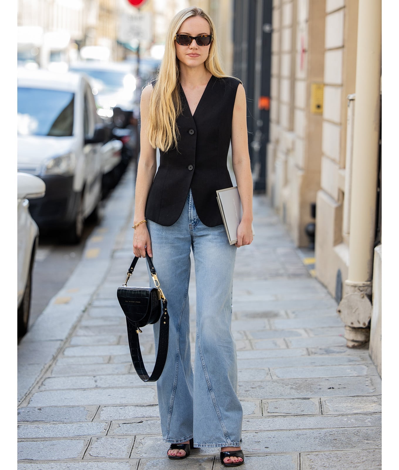 Black Vest with Light Wash Flare Jeans — Elegant Vest Outfits