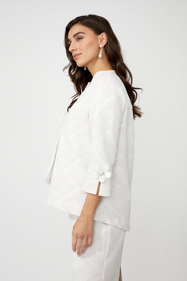 White Cropped Jacket With Floral Embellishments White Cropped Jacket With Floral Embellishments — Elegant White Jacket Outfit
