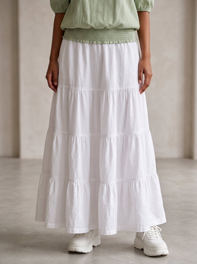White Tiered Cotton Maxi Skirt With Smocked Top White Tiered Cotton Maxi Skirt With Smocked Top — Elegant White Maxi Skirt Outfit
