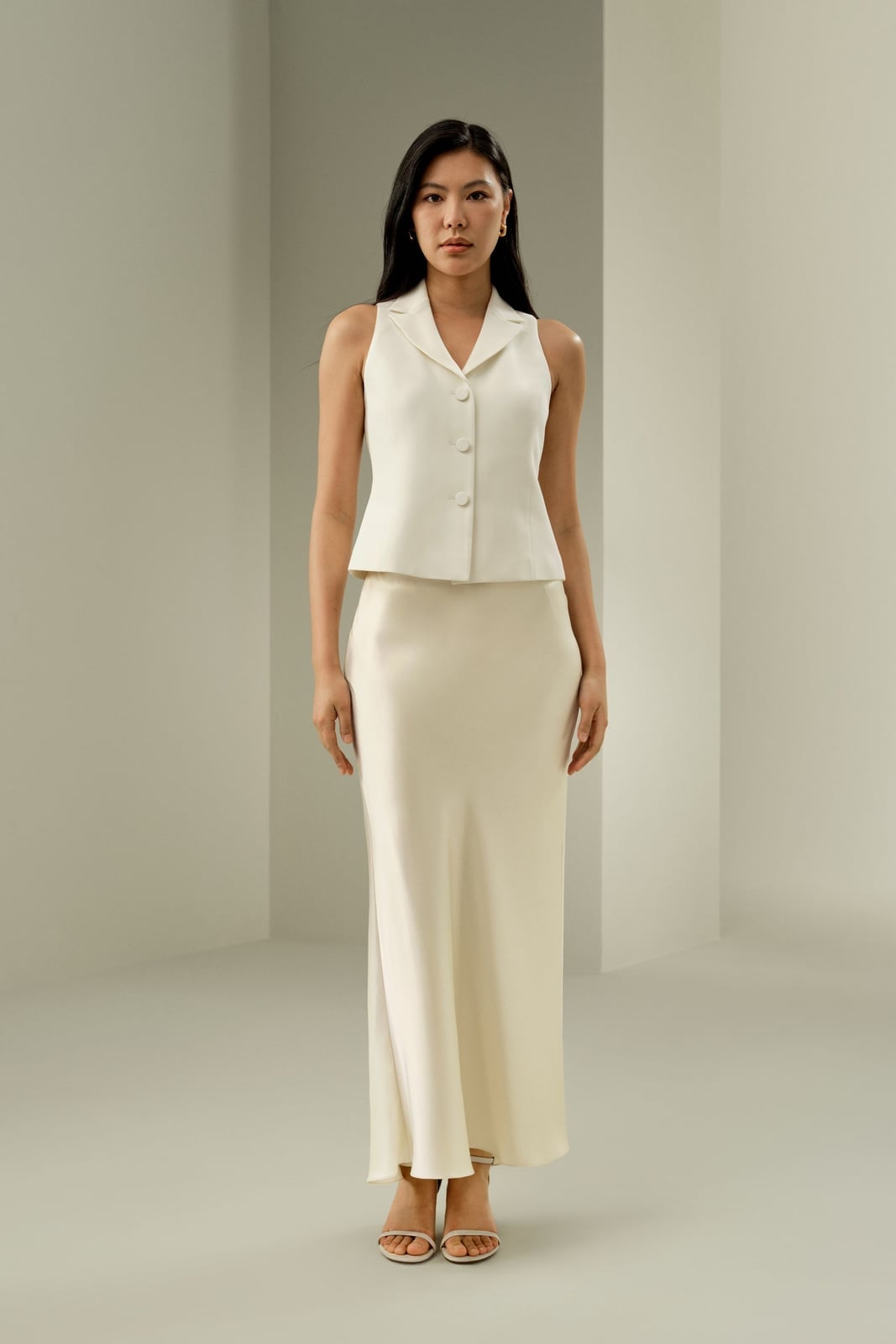 Ivory Satin Maxi Skirt With White Vest Ivory Satin Maxi Skirt With White Vest — Elegant White Maxi Skirt Outfit