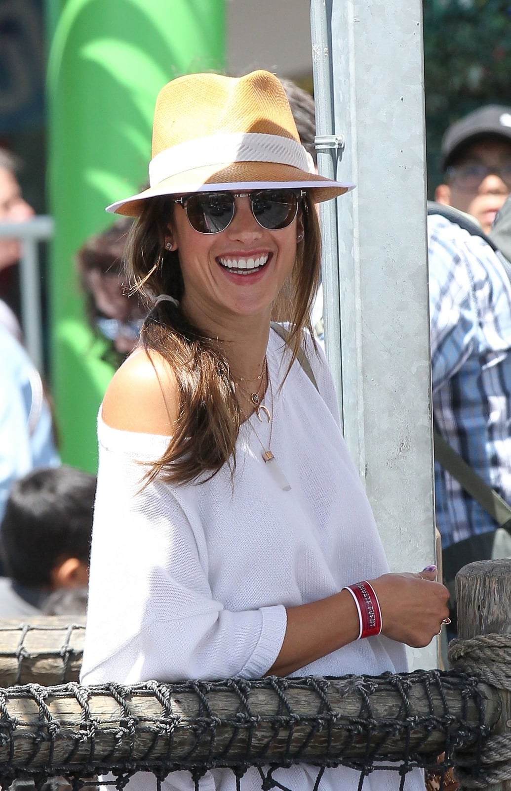 Shoulder-Length Dark Brown Wavy Ponytail — Hair Ideas with Hat