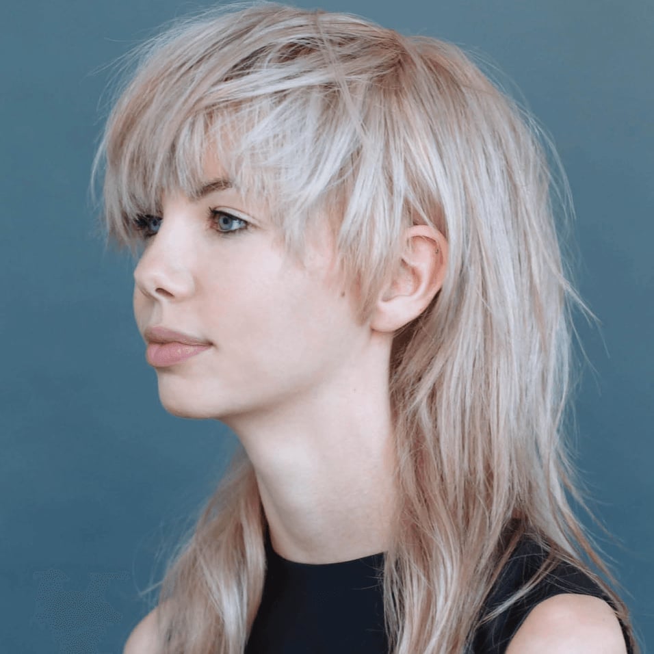 Collarbone Ash Blonde Shag With Full Bangs Collarbone Ash Blonde Shag With Full Bangs — Modern Shag Inspo