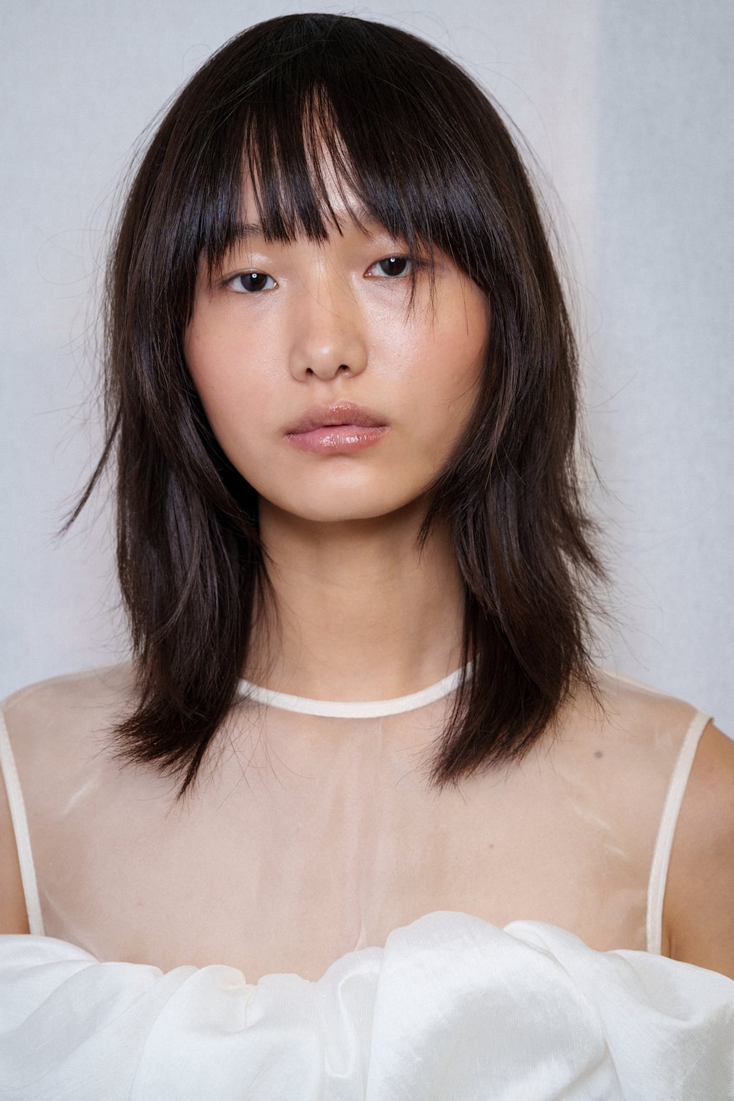Shoulder Length Dark Brown Shag With Blunt Bangs Shoulder Length Dark Brown Shag With Blunt Bangs — Modern Shag Inspo