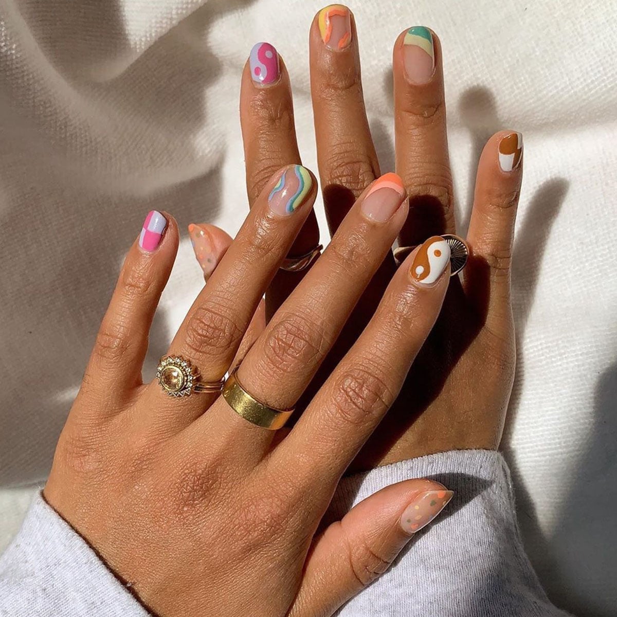 Short Almond Nude With Abstract Rainbow Art Short Almond Nude With Abstract Rainbow Art — Nails Easy Ideas