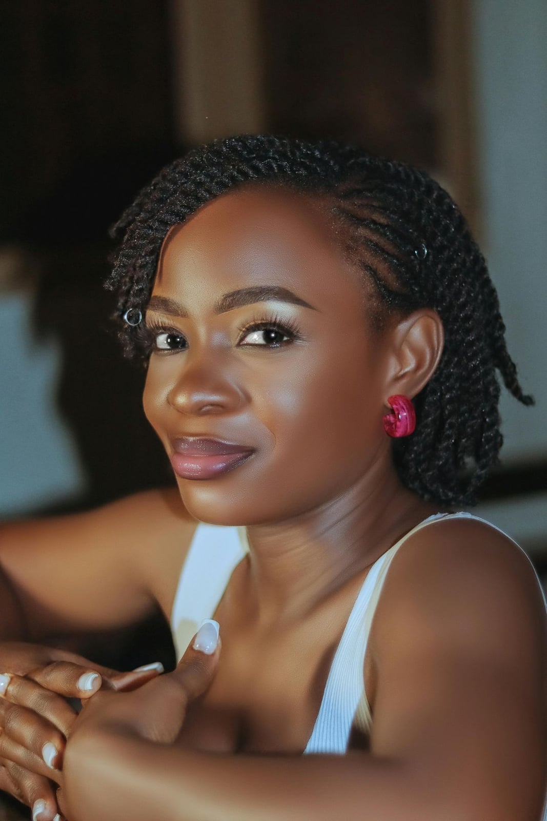 Short Twisted Braids With Metal Ring Embellishments Short Twisted Braids With Metal Ring Embellishments — Natural Hair Braiding Ideas