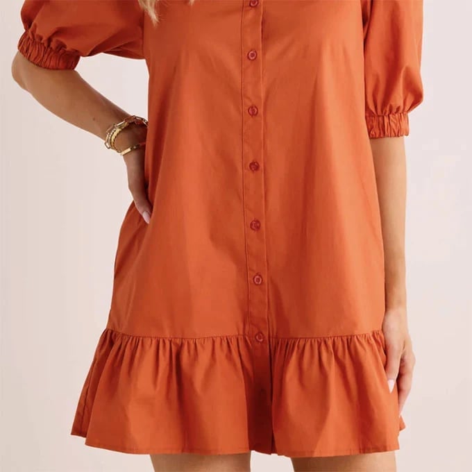 Burnt Orange Button-Down Dress with Ruffled Hem, Close-Up Take Burnt Orange Button-Down Dress with Ruffled Hem, Close-Up Take — Orange Dress Ideas