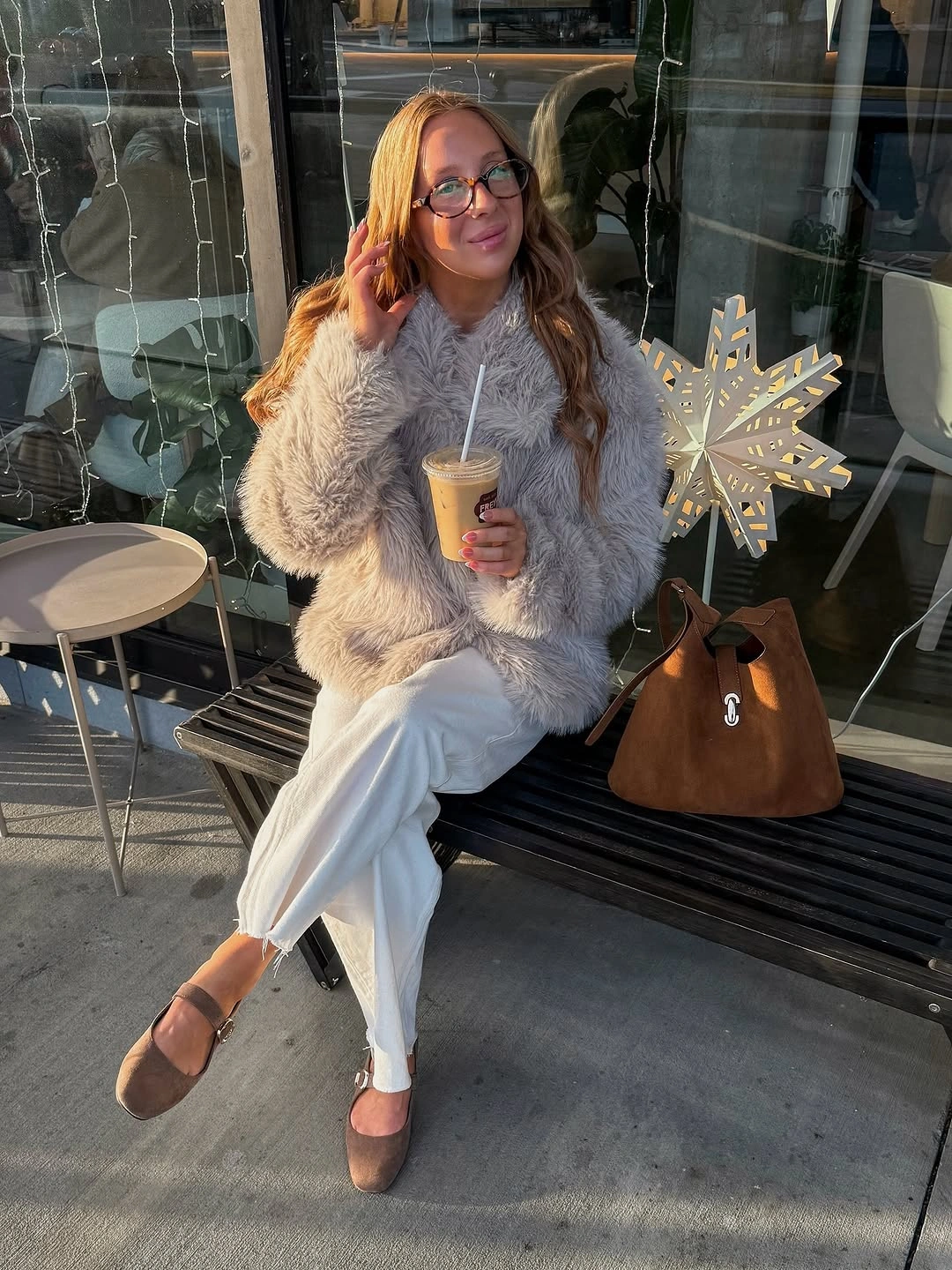 Pale textured jacket with white trousers brown flats and brown tote bag