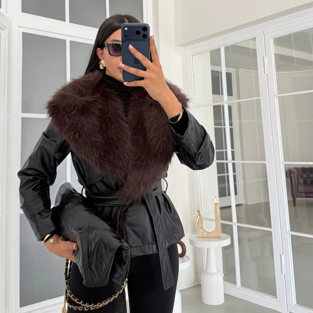 Black belted leather look jacket with large dark brown collar and chain handbag