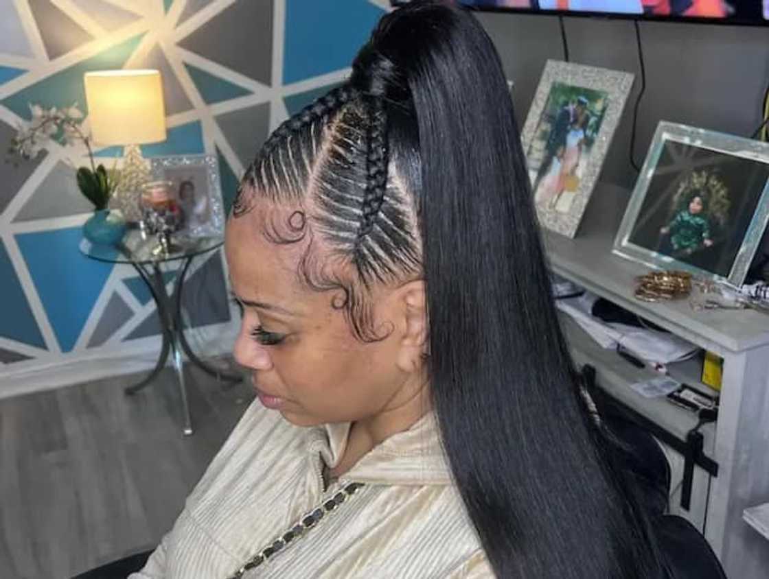 Black Ponytail With Braided Accents and Baby Hairs Black Ponytail With Braided Accents and Baby Hairs — Quick Weave Ponytail Ideas