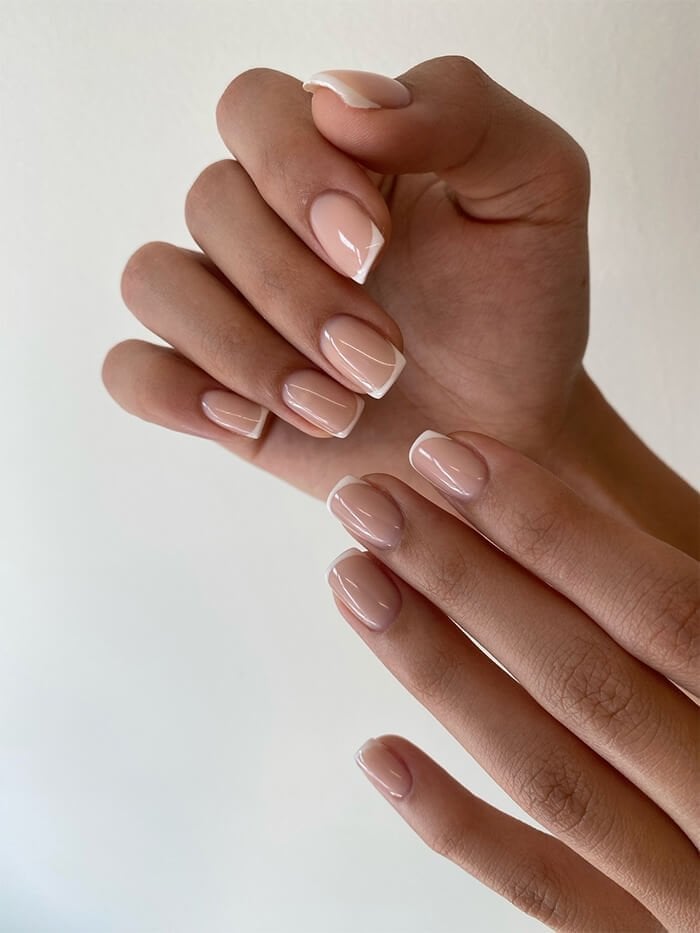 Sheer Nude with Sharp White French Tips Sheer Nude with Sharp White French Tips — Russian Manicure Designs