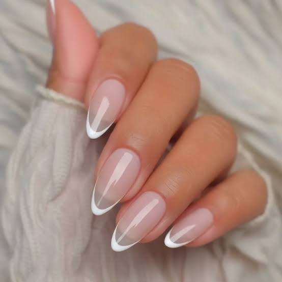 Sheer Nude Almond Nails With Thin White French Tip Sheer Nude Almond Nails With Thin White French Tip — Simple Almond Nails