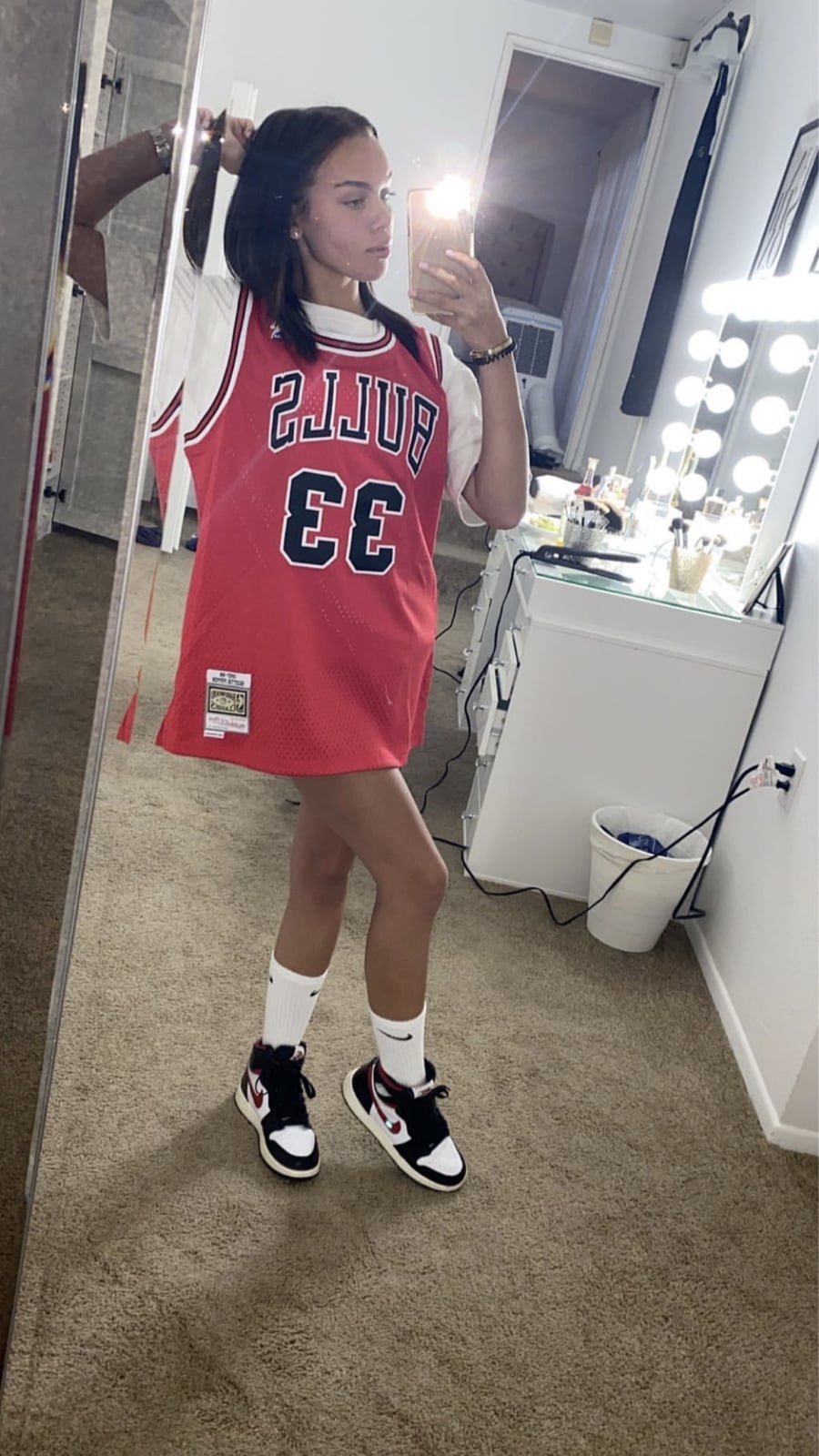Oversized Red Jersey Over White T-Shirt with Sneakers Oversized Red Jersey Over White T-Shirt with Sneakers — Simple Basketball Game Outfits