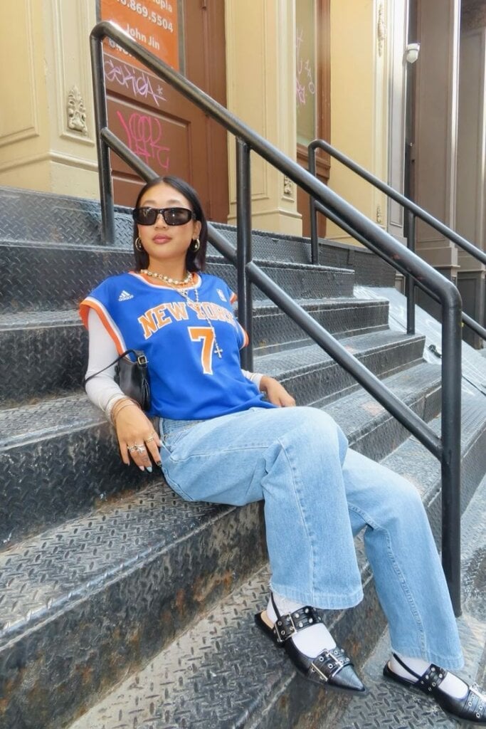 Layered Jersey and Long-Sleeve with Wide-Leg Jeans Layered Jersey and Long-Sleeve with Wide-Leg Jeans — Simple Basketball Game Outfits