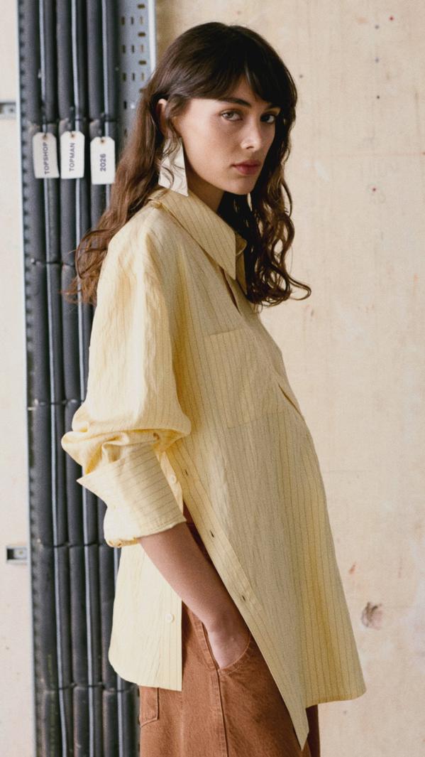 Textured Yellow Shirt with Brown Trousers and Statement Earrings Textured Yellow Shirt with Brown Trousers and Statement Earrings — Simple Button Down Outfits