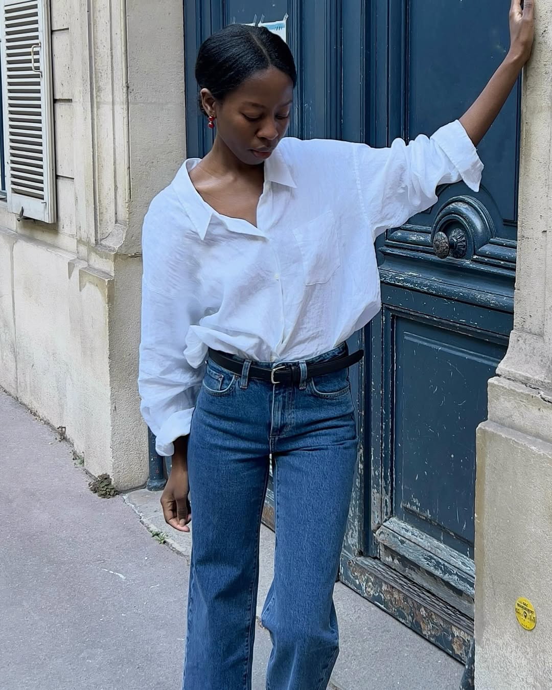 White Shirt Partially Unbuttoned with Straight-Leg Jeans White Shirt Partially Unbuttoned with Straight-Leg Jeans — Simple Button Down Outfits