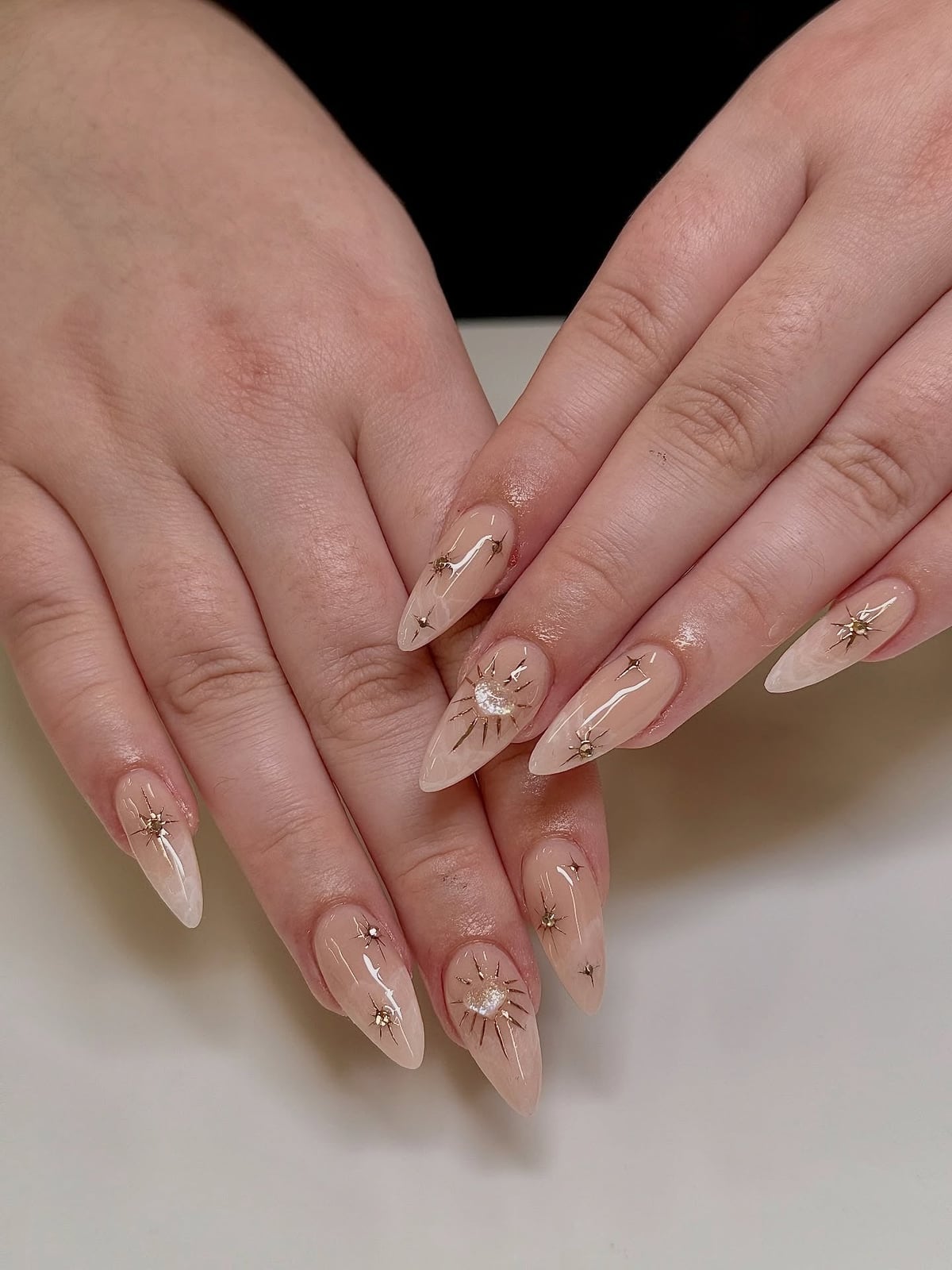 Nude Peach Celestial Motifs Medium Stiletto Almond Nails Nude Peach Celestial Motifs Medium Stiletto Almond Nails — Simple Champagne Nails