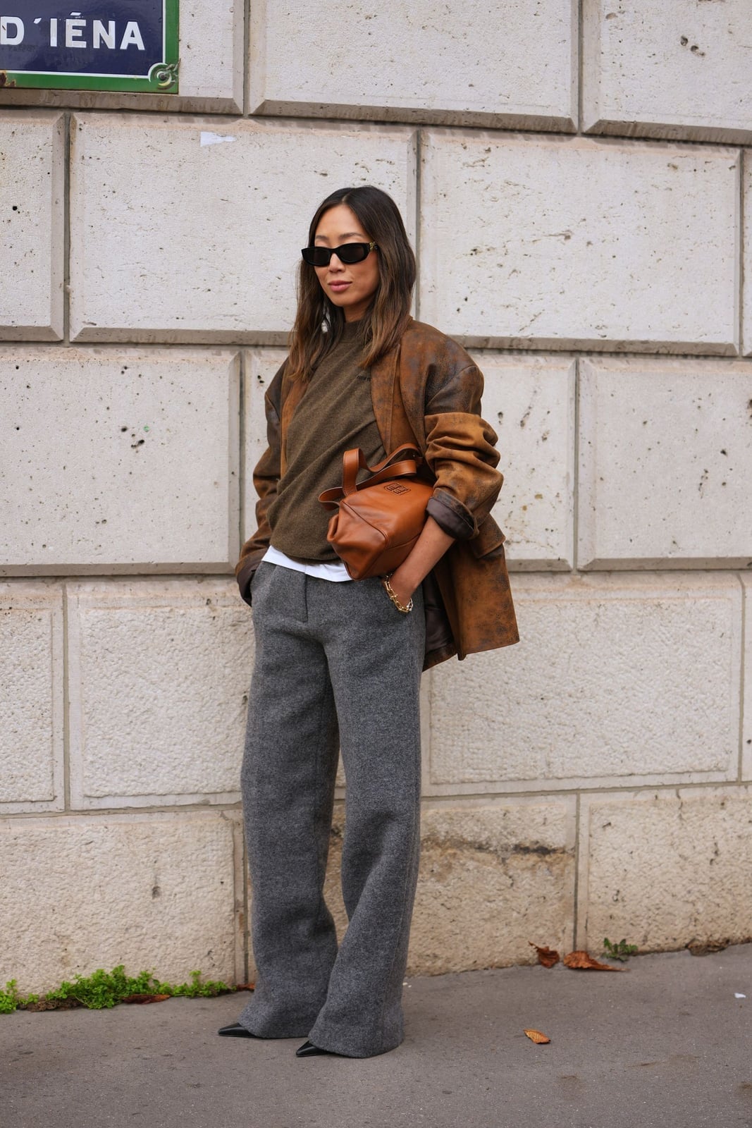Brown Leather Jacket Over Knit Sweater with Grey Wool Trousers Brown Leather Jacket Over Knit Sweater with Grey Wool Trousers — Simple Corporate Outfits for Women