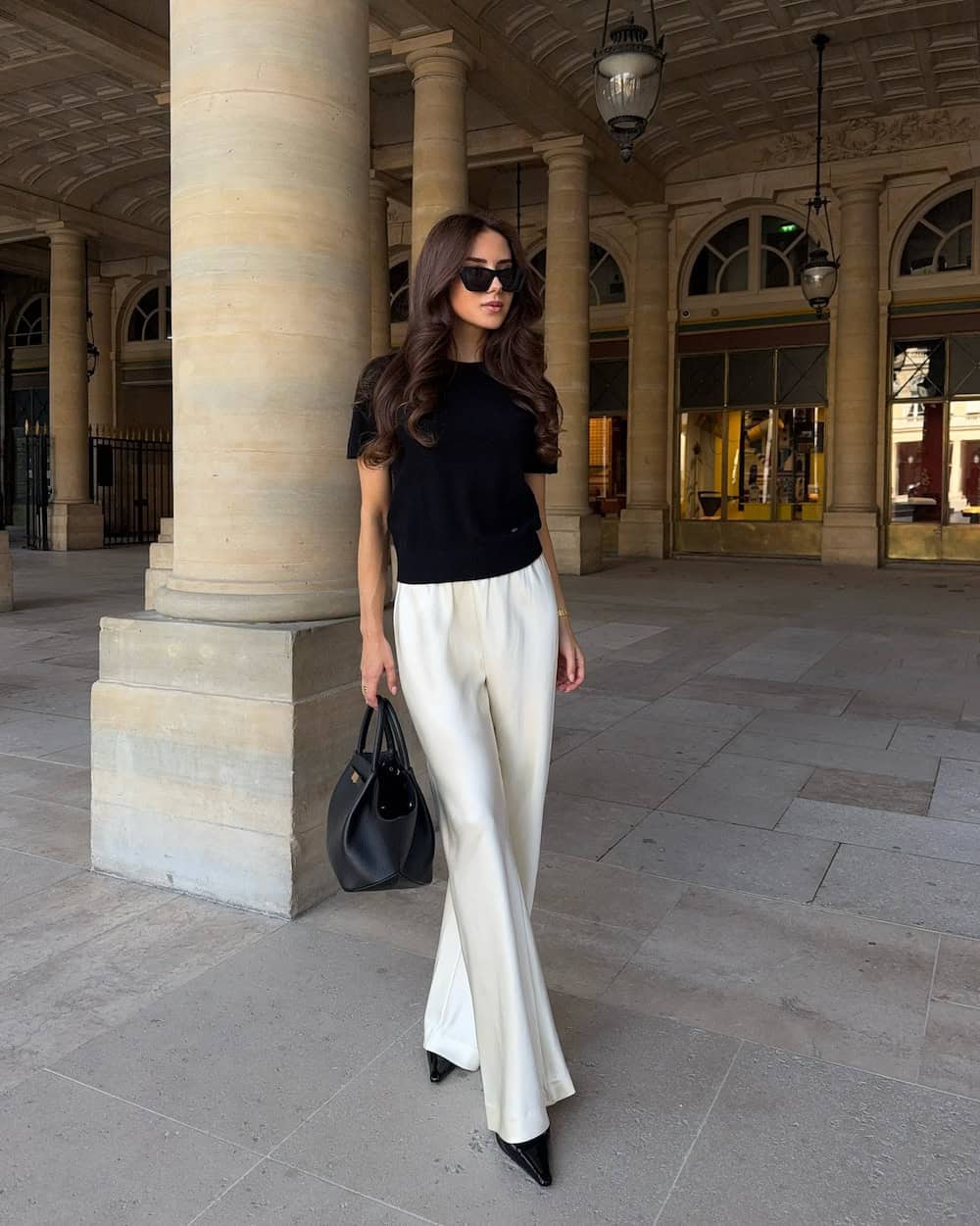 Black Knit Top with White Wide-Leg Trousers, Close-Up Take Black Knit Top with White Wide-Leg Trousers, Close-Up Take — Simple Corporate Outfits for Women