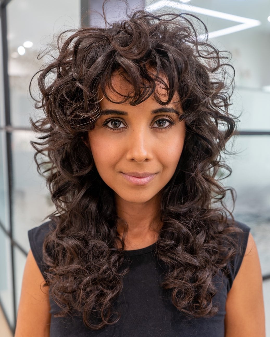 Collarbone Shag With Textured Curls Collarbone Shag With Textured Curls — Simple Curly Bangs